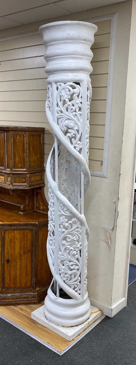 A pair of large white painted fibre glass helical columns, height 239cm